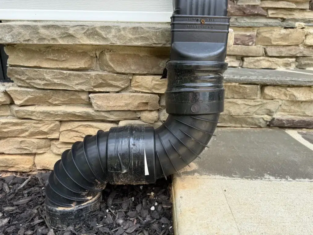 Downspout Drainage into a pipe underground