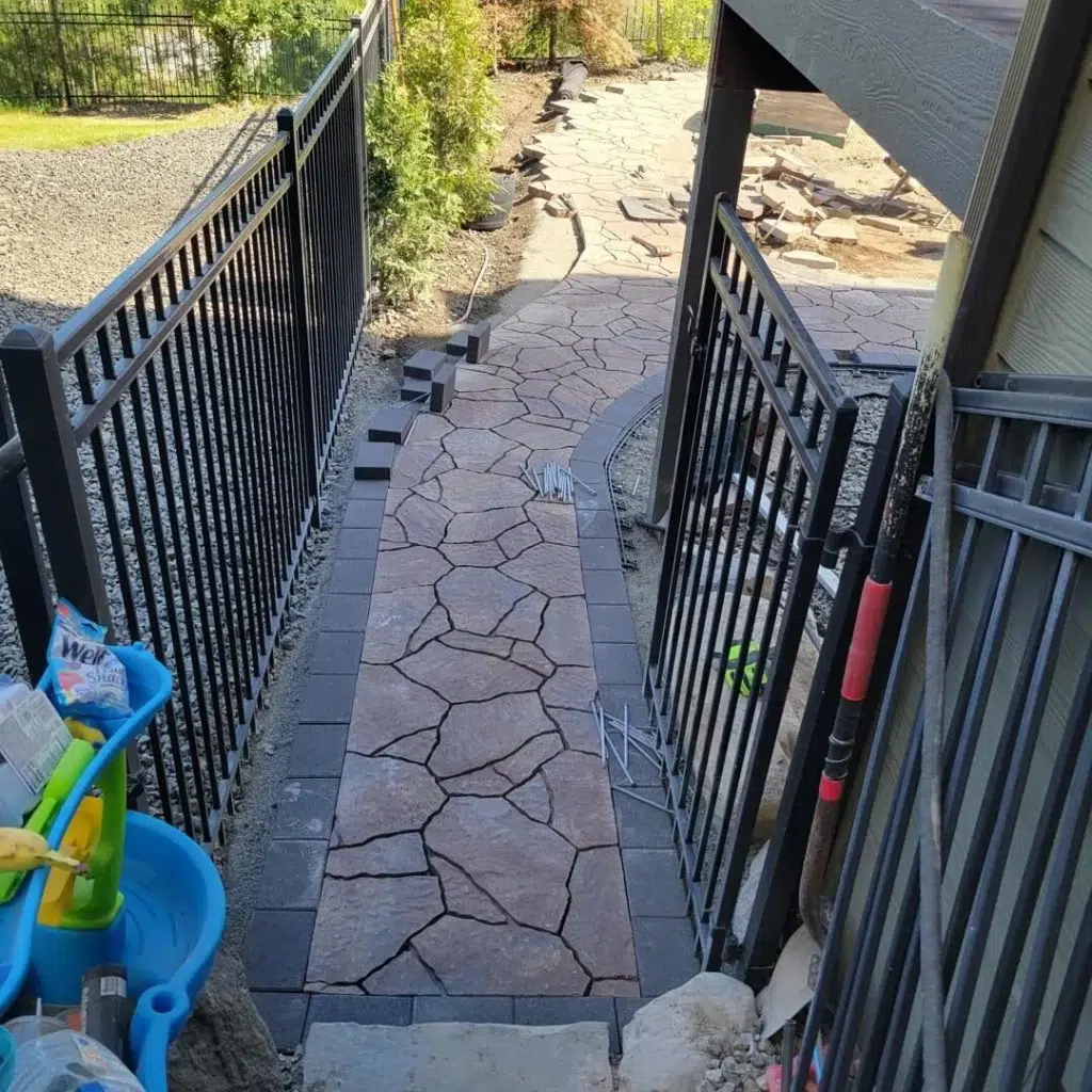 Narrow Flagstone Walkway with Decorative Gate